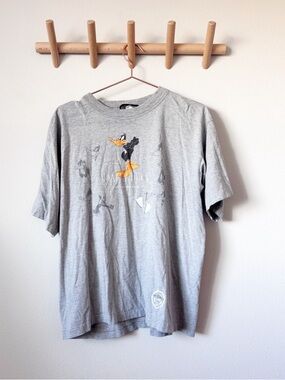 Warner Bros. Grey Daffy Duck Short Sleeve Tee with Orange Accents